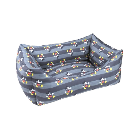 Cuccia imbottita per cani con sponde rialzate, righe grigie e stampe ripetute di un personaggio con guanti bianchi, pantaloncini rossi e scarpe gialle.