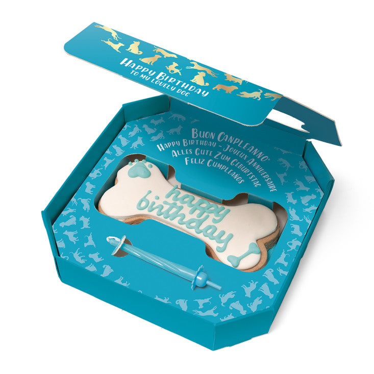 Confezione azzurra Doggye Bone DoggyeBag con tortina artigianale per il compleanno del cane