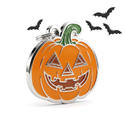Medaglietta Zucca arancione con gambo verde e sorriso intagliato, per Halloween